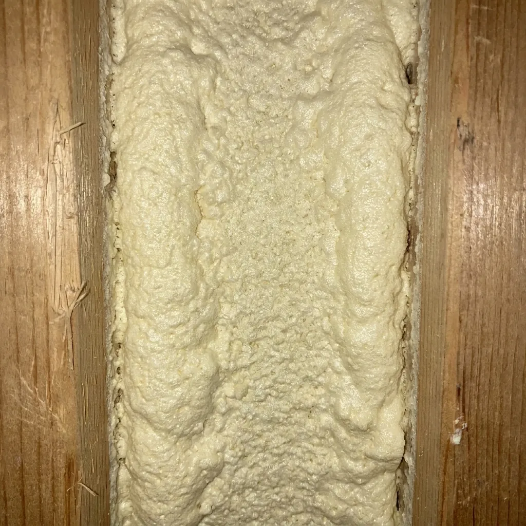 Close-up of cured closed-cell spray foam insulation